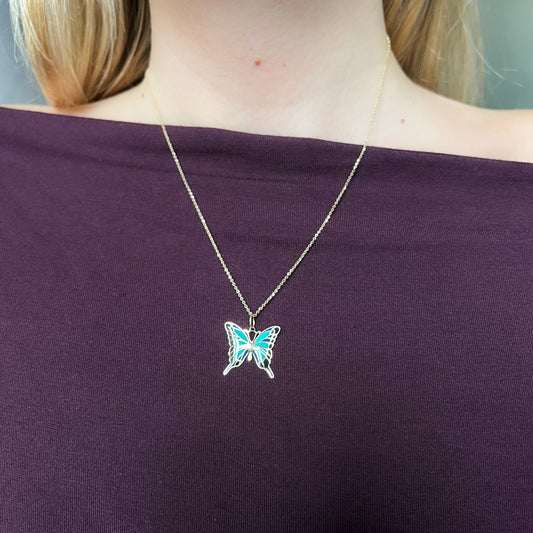 Colgante Mariposa Azul Danaus en Oro Amarillo de 9 Kilates