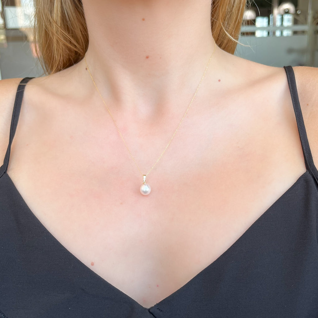 Conjunto Tahití de Pendientes y Colgante en Oro Amarillo 9 Kilates