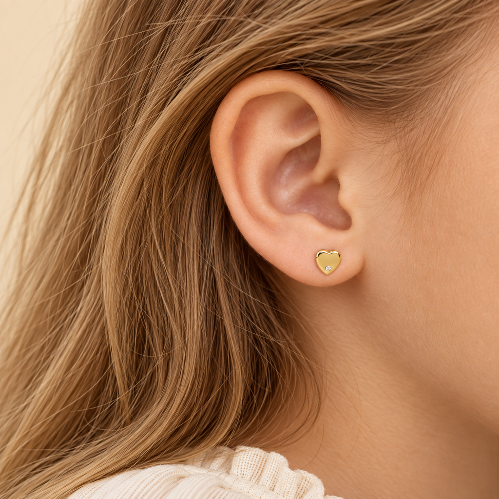 Pendientes Niña Corazón en Oro Amarillo 9 Kilates con Circonita