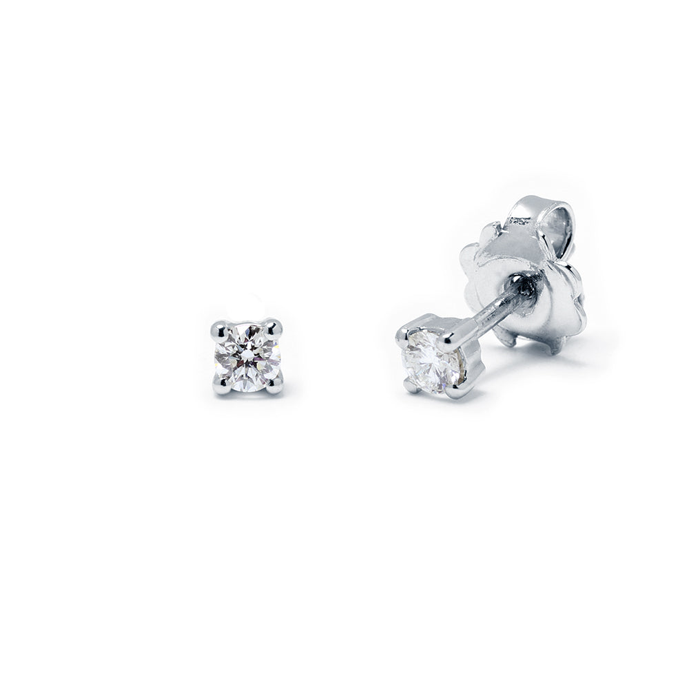 Pendientes 4 Grapas de Diamantes 0.20 Quilates en Platino