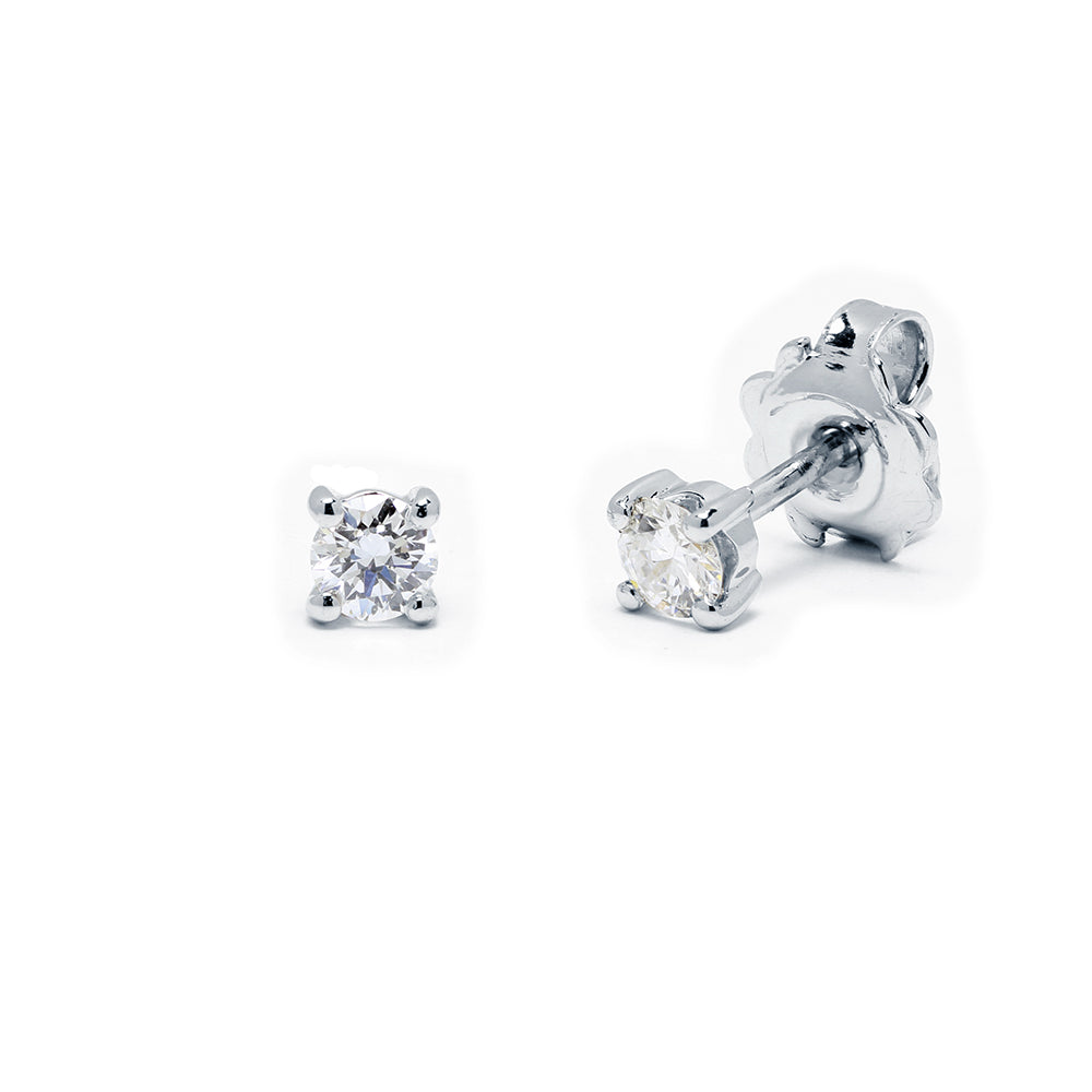 Pendientes 4 Grapas de Diamantes 0.30 Quilates en Platino